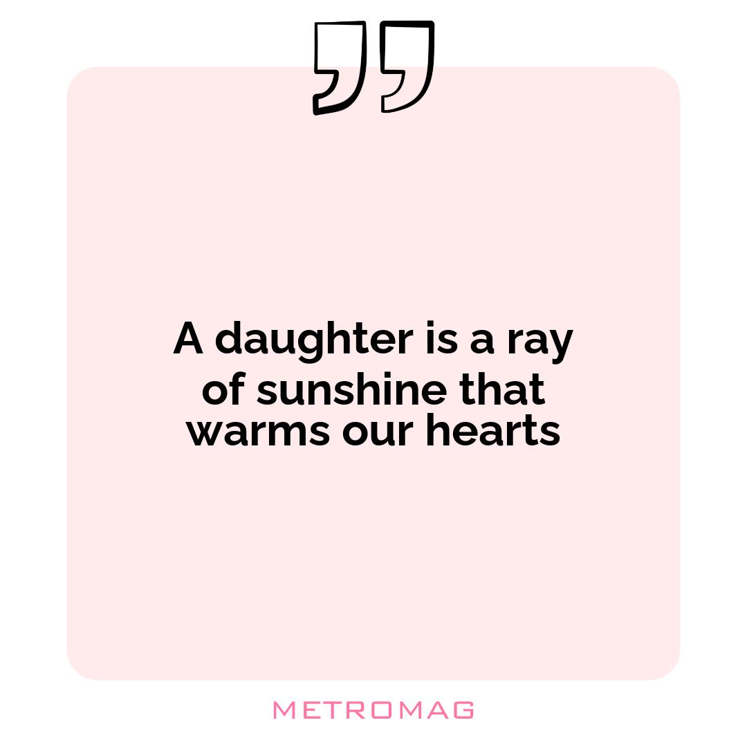 A daughter is a ray of sunshine that warms our hearts