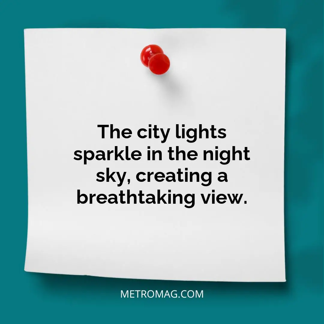 The city lights sparkle in the night sky, creating a breathtaking view.